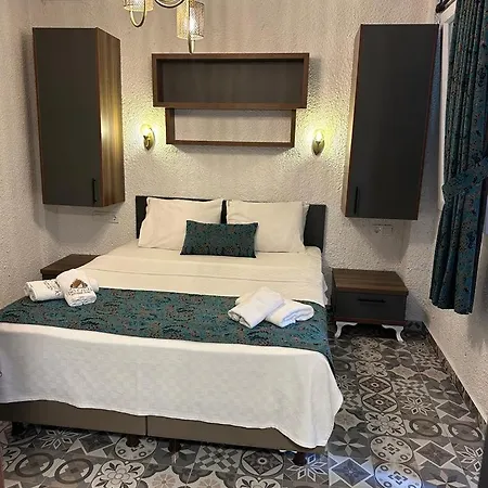 The Castle Butik Sigacik Δωμάτια σε οικογενειακή κατοικία